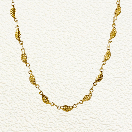 gold-toned leaf link chain made from stainless steel with delicate leaf-shaped links