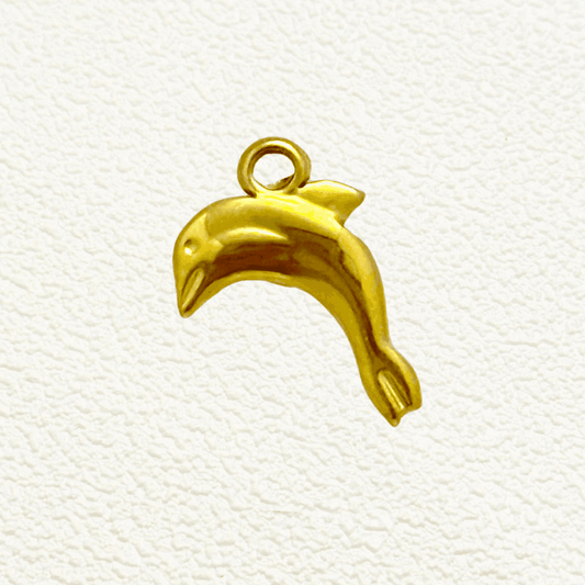 Gold dolphin charm in a leaping pose, ocean-themed PVD gold plated pendant