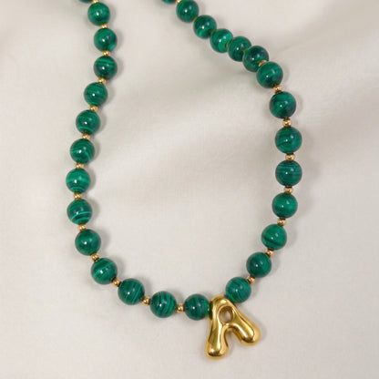 Malachite Gold Bubble Initial Necklace with polished green beads, gold spacers and a sculptural initial pendant.