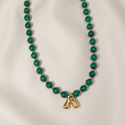 Malachite Gold Bubble Initial Necklace with polished green beads, gold spacers and a sculptural initial pendant.