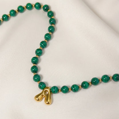 Malachite Gold Bubble Initial Necklace with polished green beads, gold spacers and a sculptural initial pendant.