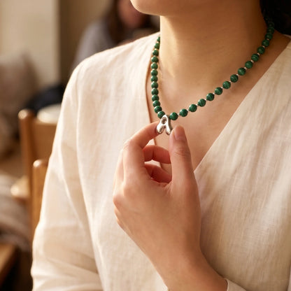 Malachite Gold Bubble Initial Necklace with polished green beads, gold spacers and a sculptural initial pendant.
