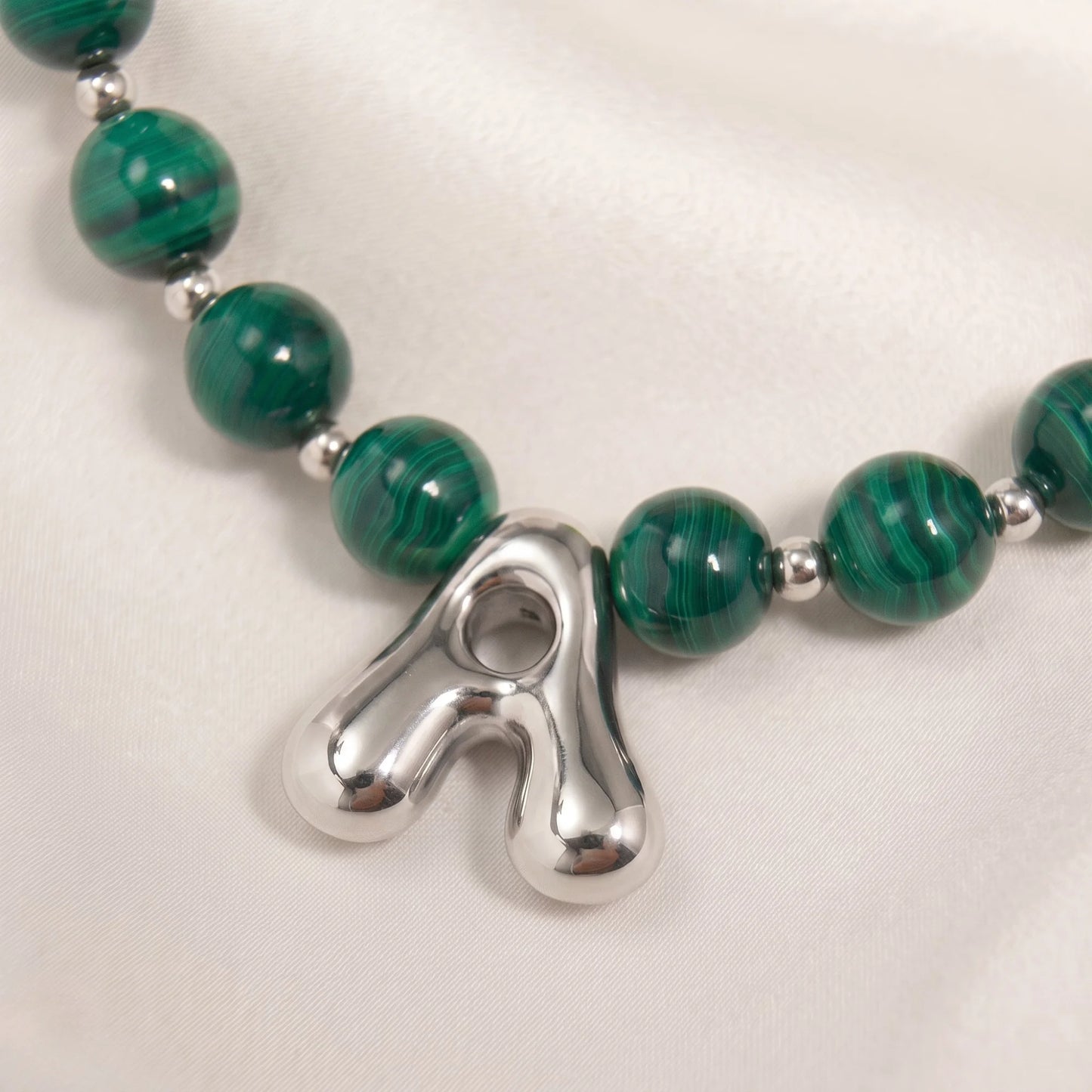 Malachite Gold Bubble Initial Necklace with polished green beads, gold spacers and a sculptural initial pendant.