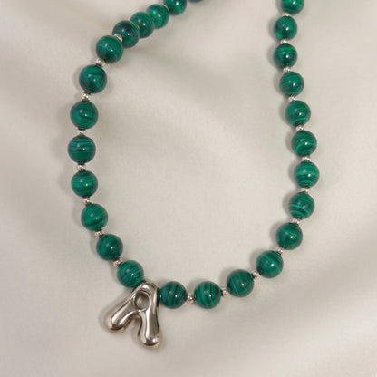 Malachite Gold Bubble Initial Necklace with polished green beads, gold spacers and a sculptural initial pendant.