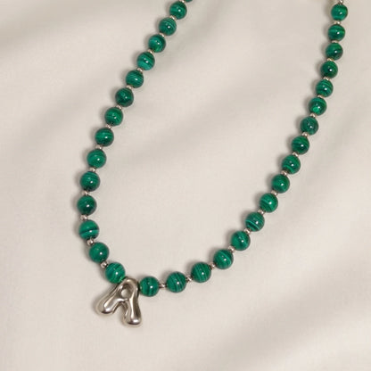 Malachite Gold Bubble Initial Necklace with polished green beads, gold spacers and a sculptural initial pendant.