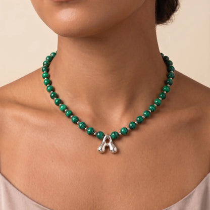 Malachite Gold Bubble Initial Necklace with polished green beads, gold spacers and a sculptural initial pendant.