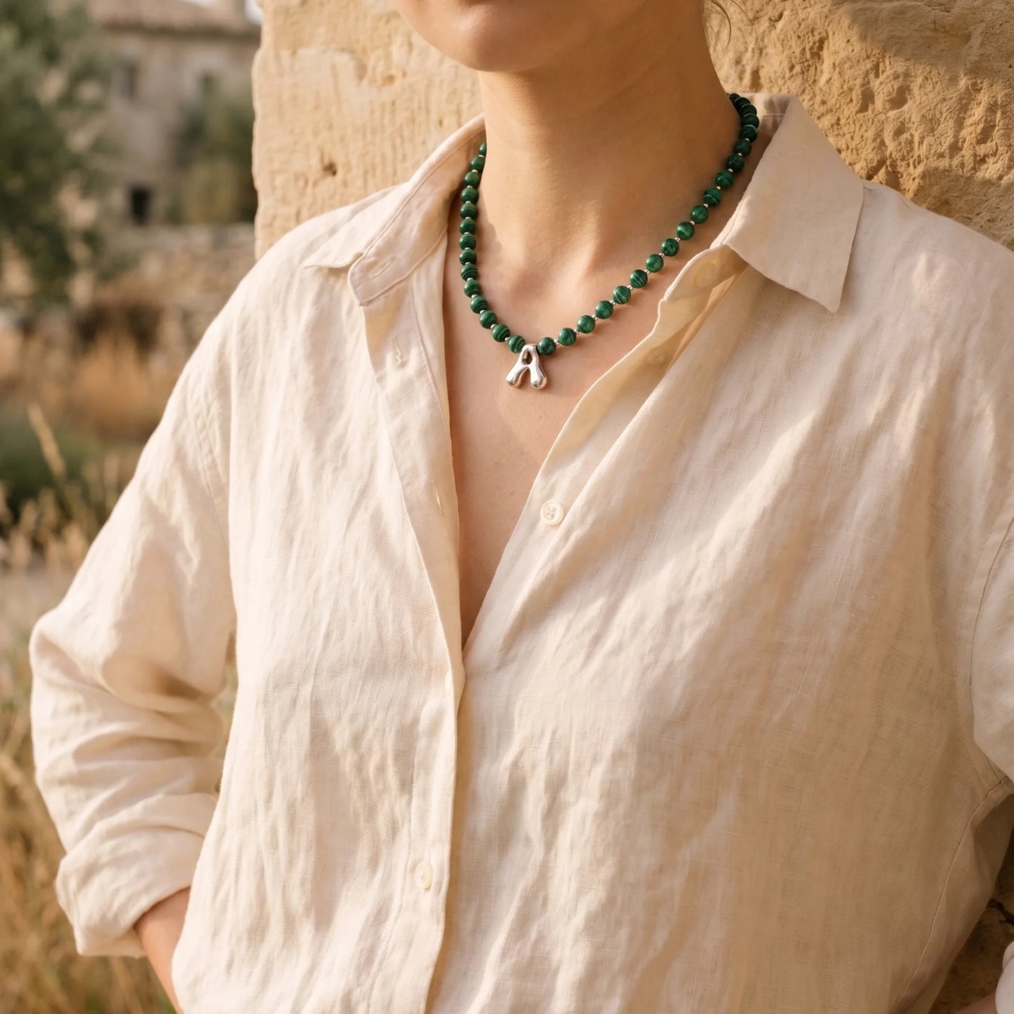 Malachite Gold Bubble Initial Necklace with polished green beads, gold spacers and a sculptural initial pendant.