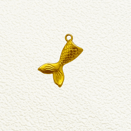 Gold Mermaid Tail Charm with scale detail and curved fluke design