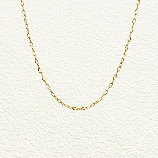 Mini paperclip link chain in 18K gold-plated stainless steel with fine elongated oval links, waterproof and tarnish-resistant, ideal for minimalist layering or adding custom charms