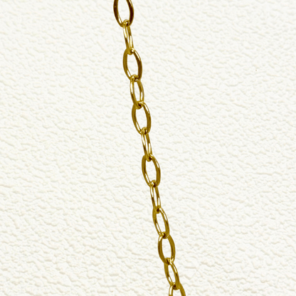 Mini paperclip link chain in 18K gold-plated stainless steel with fine elongated oval links, waterproof and tarnish-resistant, ideal for minimalist layering or adding custom charms