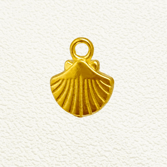 Gold scallop seashell charm with fine ridged texture, PVD gold plated finish