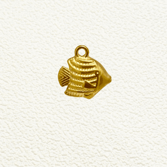 Small gold tropical fish charm with textured detail and solid construction