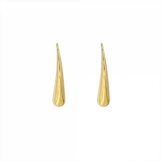 Pair of polished gold tapered raindrop earrings with elongated hook design on white background.