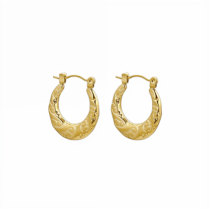 Molten Swirl Gold Hoop Earrings on white background