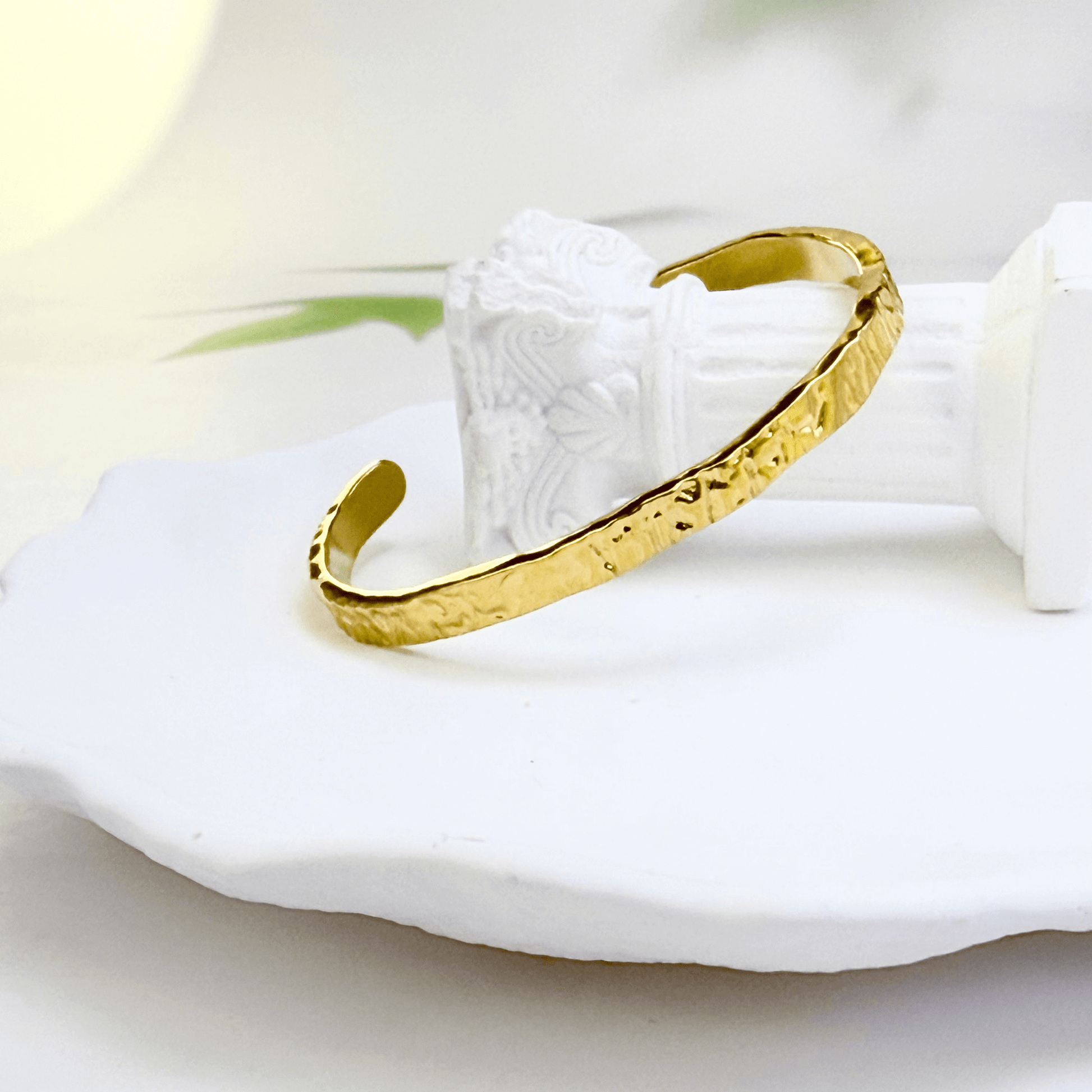 gold molten wave cuff bracelet with textured finish, adjustable and elegant design