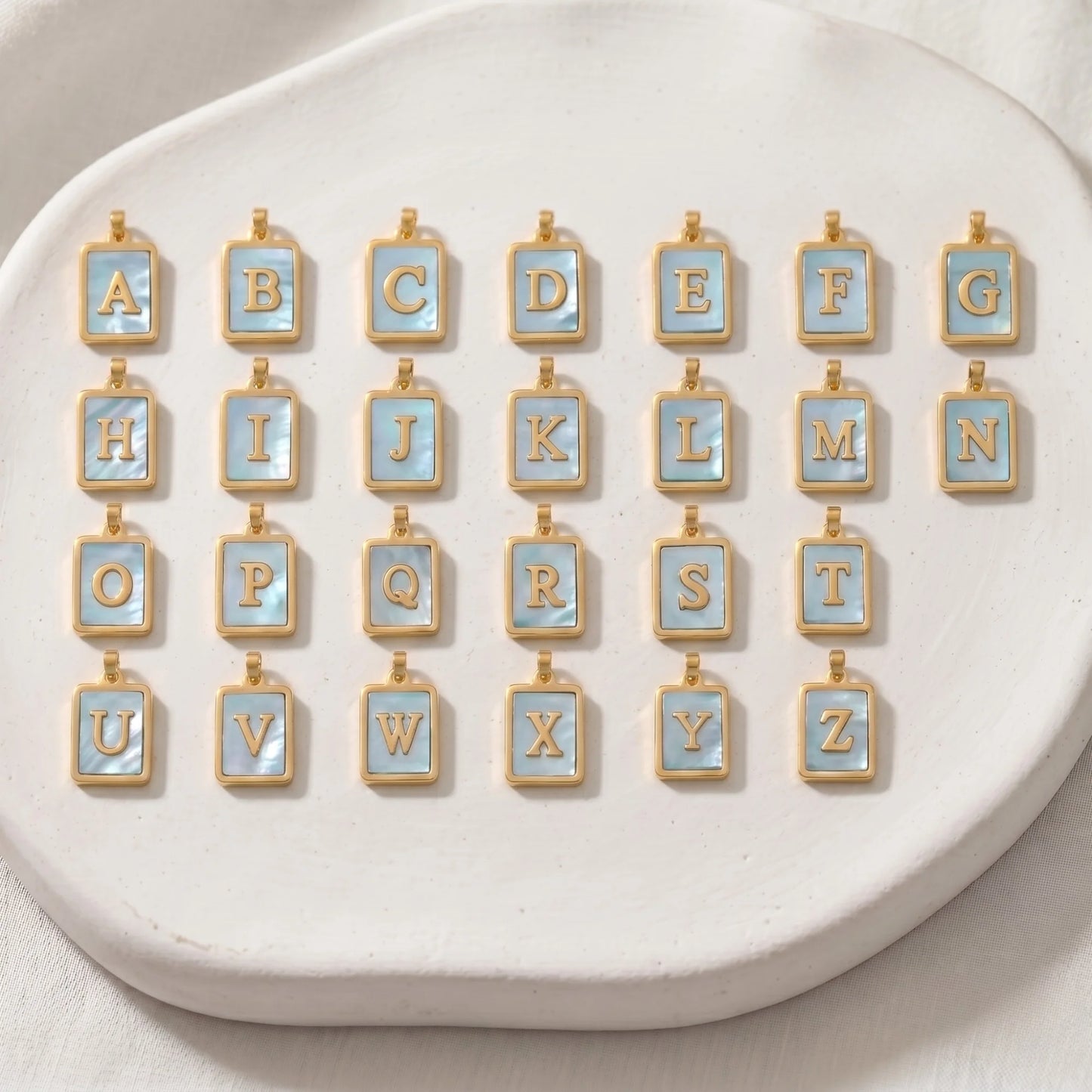 mxw jewellery blue shell initial letters