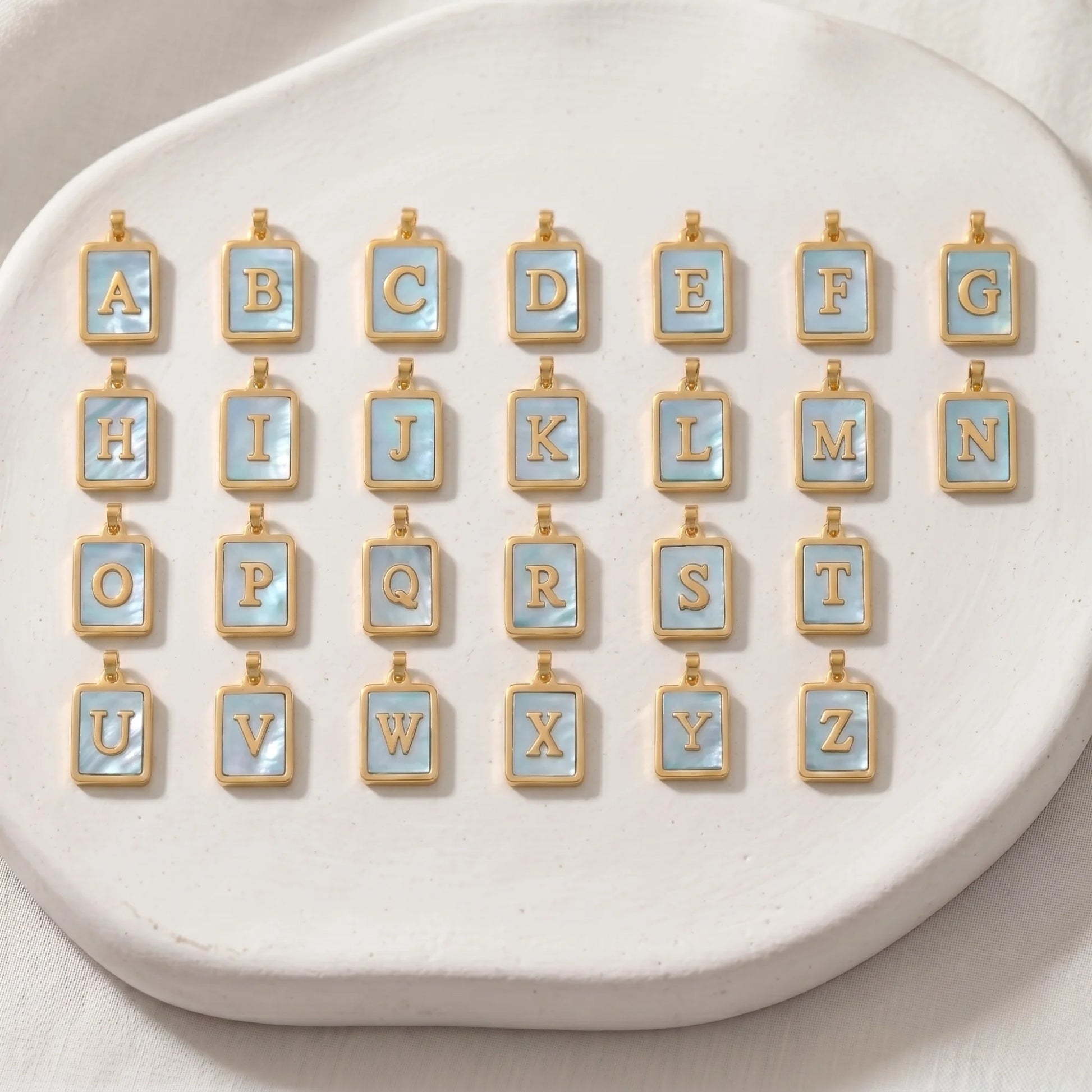 mxw jewellery blue shell initial letters