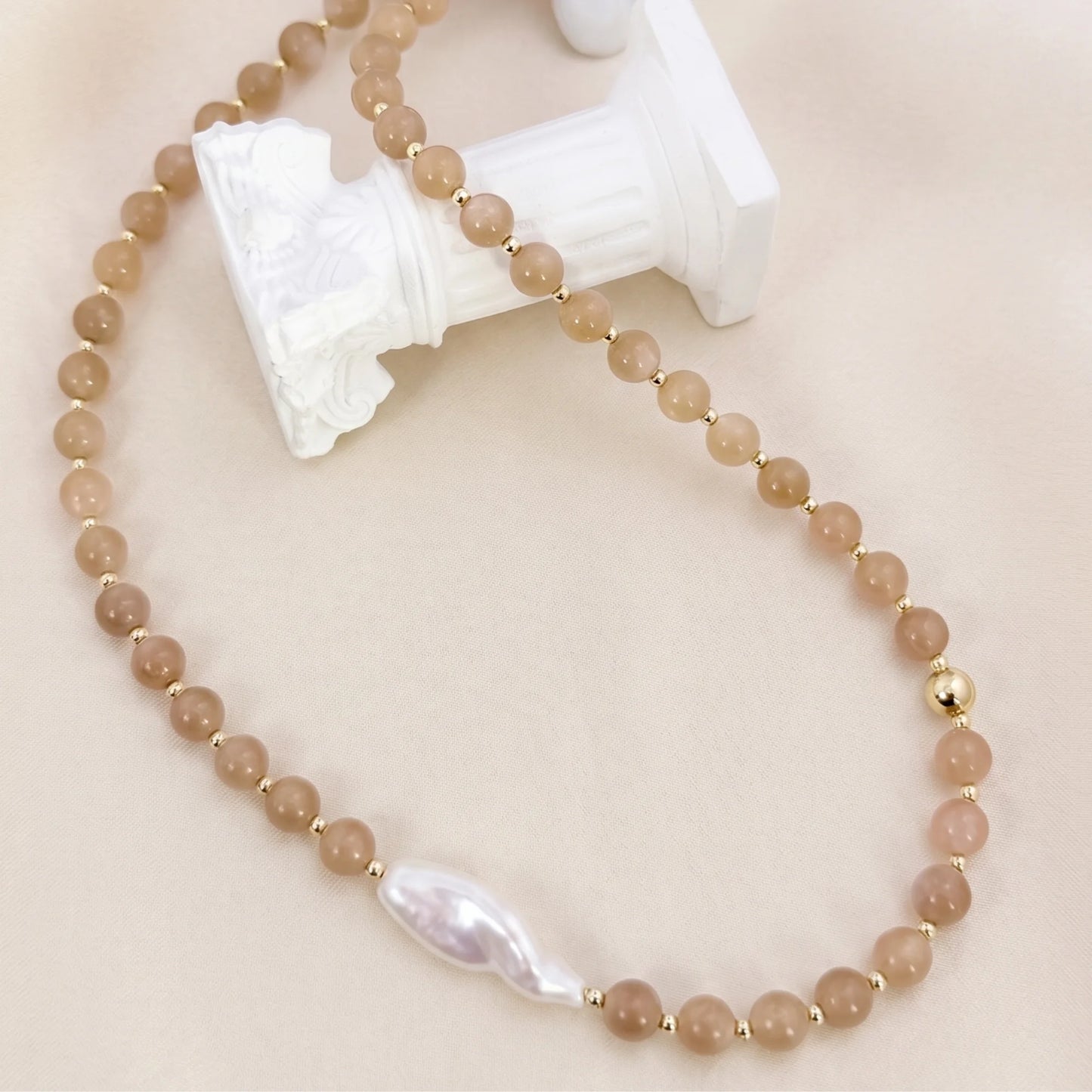 Orange moonstone necklace with 14K gold-filled beads and a baroque freshwater pearl