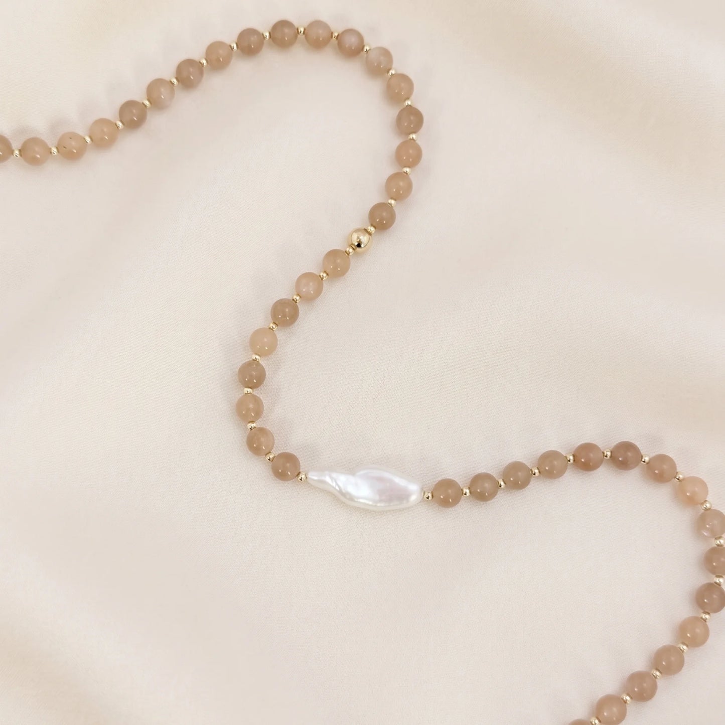 Orange moonstone necklace with 14K gold-filled beads and a baroque freshwater pearl