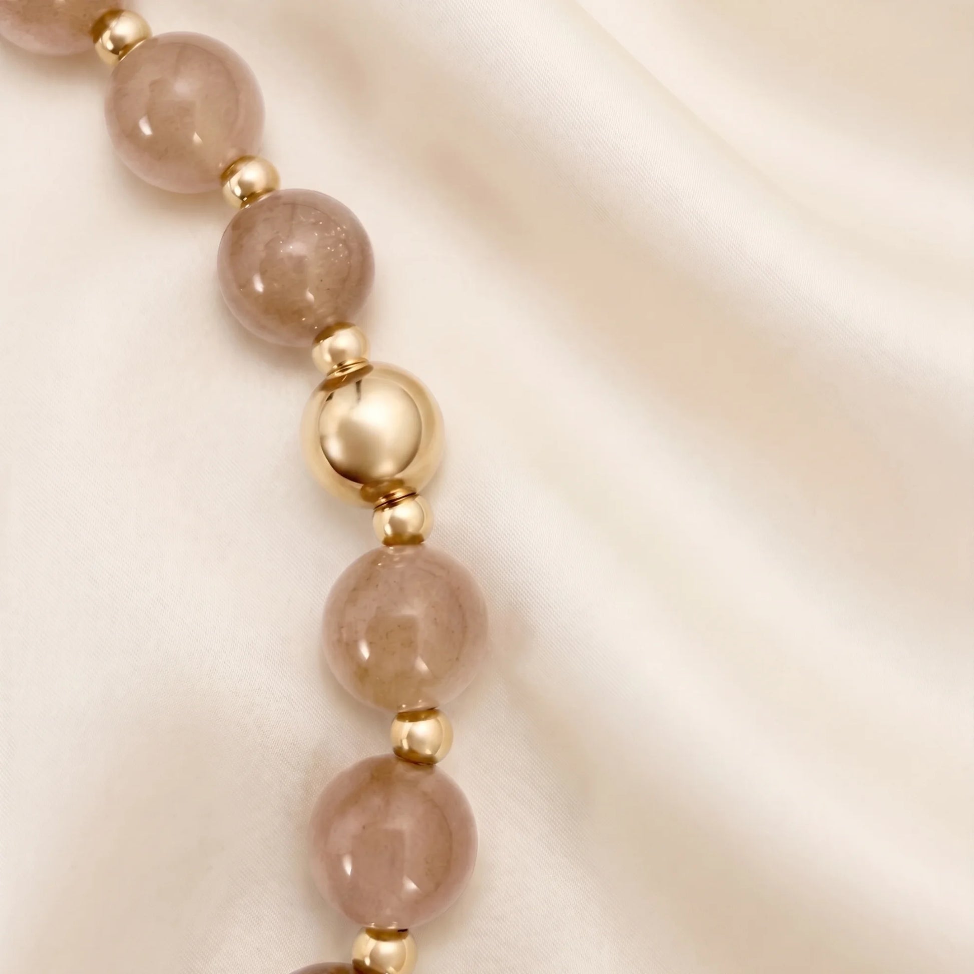 Orange moonstone necklace with 14K gold-filled beads and a baroque freshwater pearl
