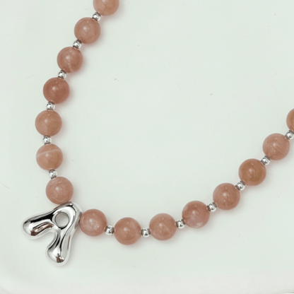 Natural orange moonstone and 925 sterling silver beaded necklace with personalised bubble initial charm, hand-finished in Australia