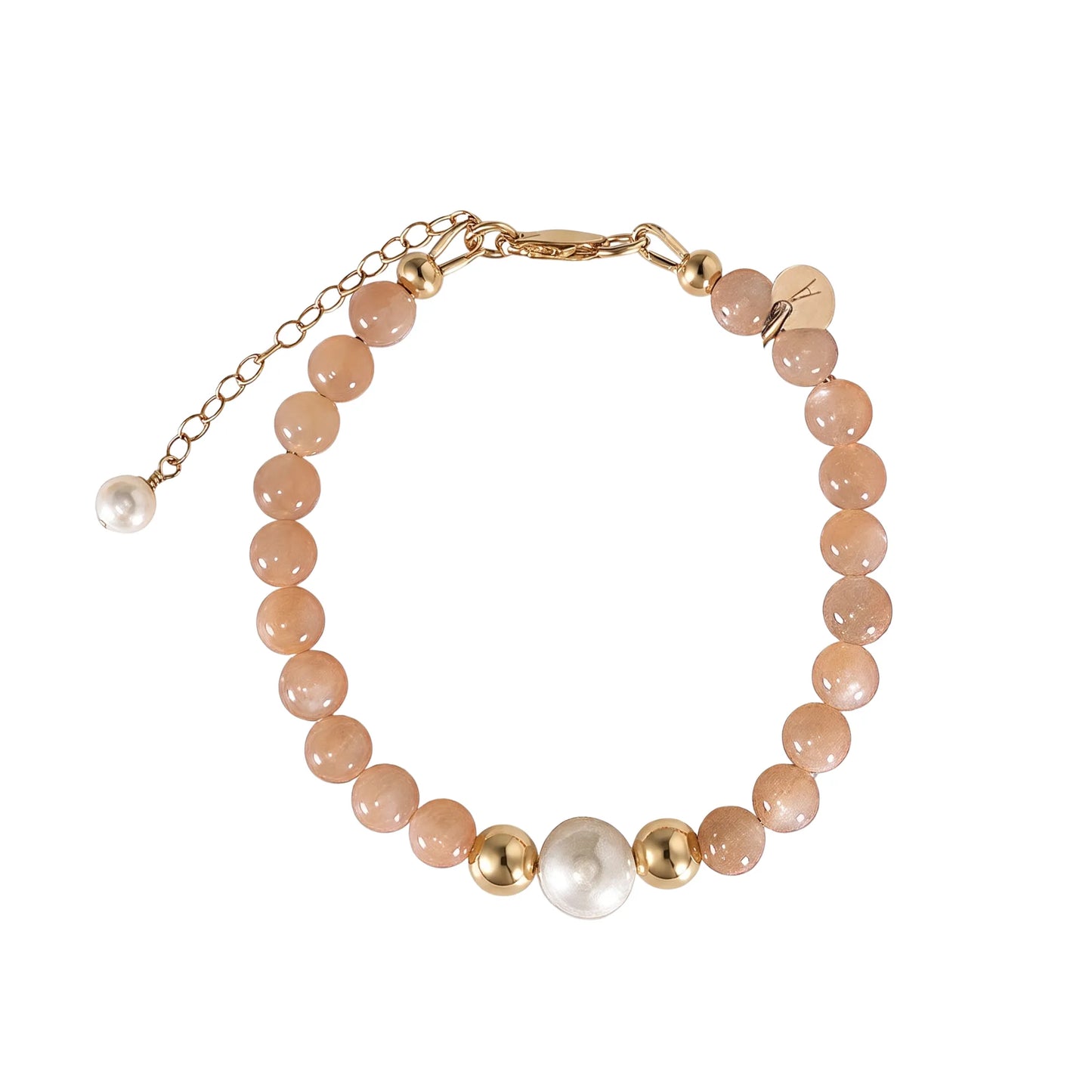 A beaded bracelet featuring peach moonstone beads, premium freshwater pearl, and a stamped initial disc, 14k gold filled. MXW Jewellery