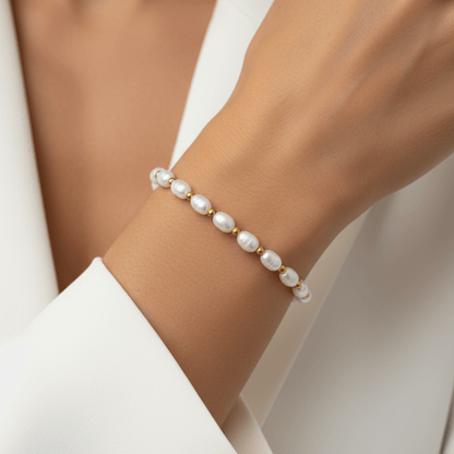 Pearl and Gold Bracelet with freshwater pearls and gold beads on stretch cord by MXW Jewellery