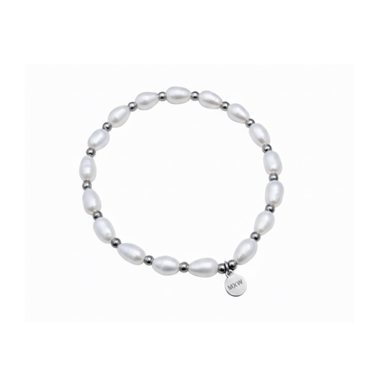 Pearl & Silver Bracelet with freshwater pearls and silver beads on stretch cord by MXW Jewellery