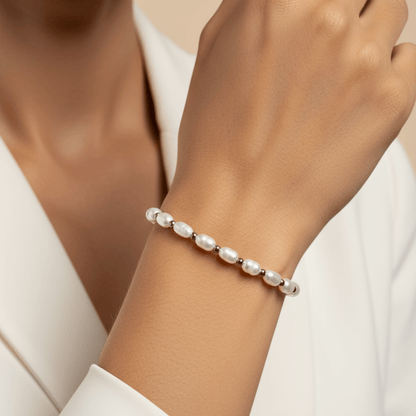 Pearl & Silver Bracelet with freshwater pearls and silver beads on stretch cord by MXW Jewellery