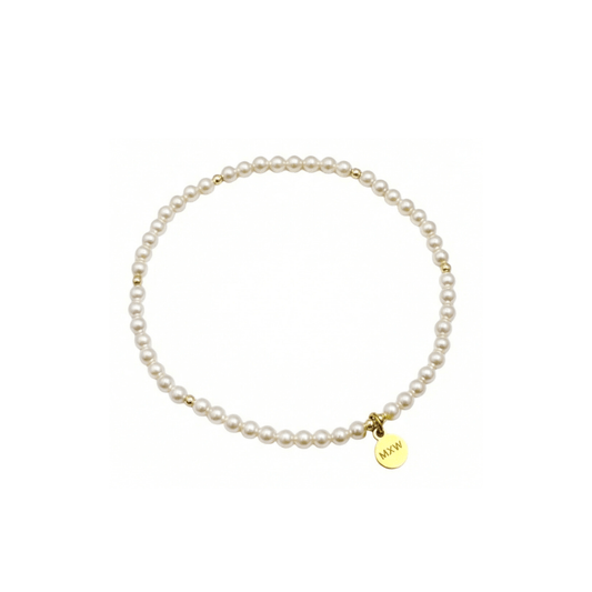 Delicate gold bracelet with Swarovski crystal pearls and gold accents