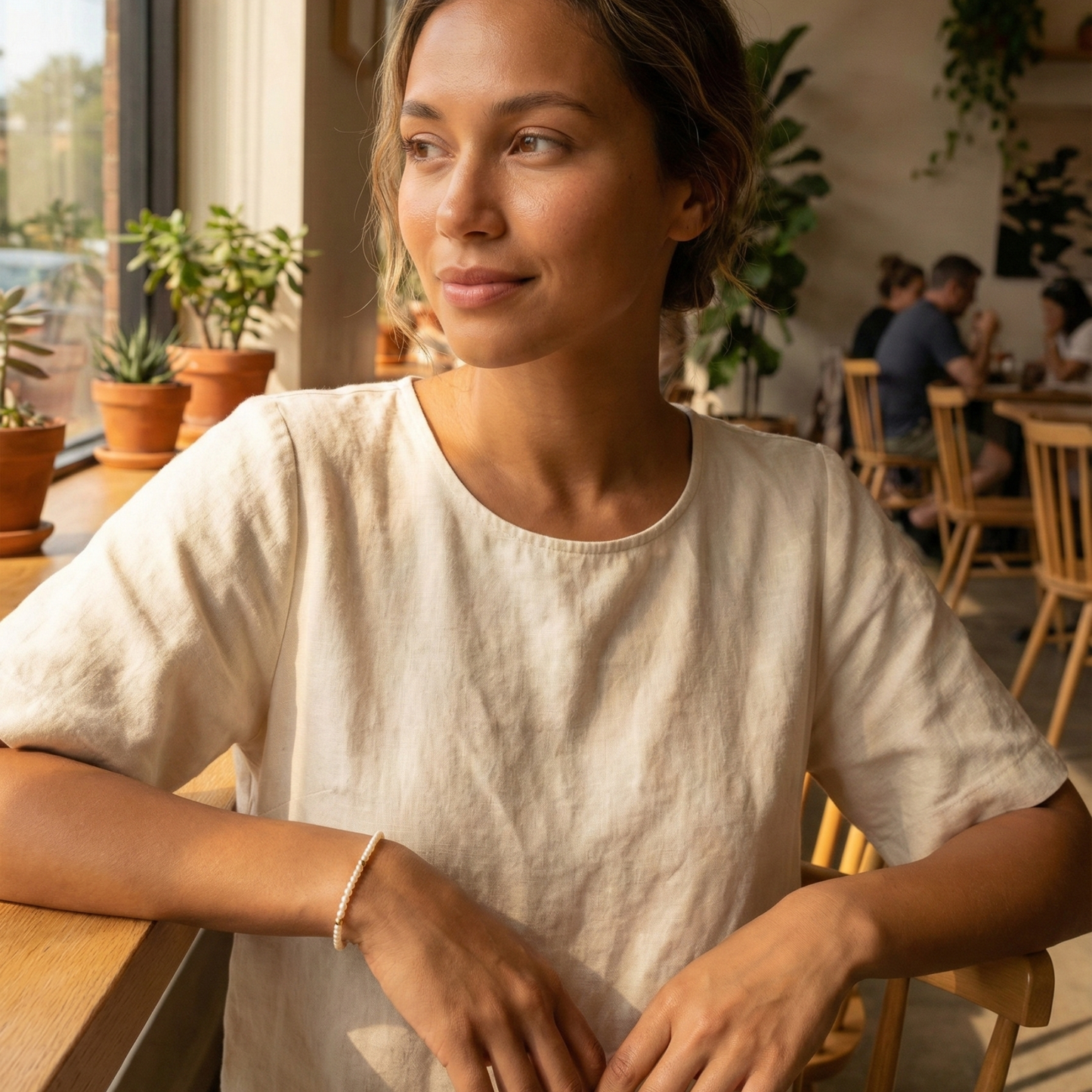 Delicate gold bracelet with Swarovski crystal pearls and gold accents