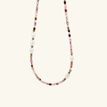 Handmade necklace with 3mm pink Czech glass beads and freshwater pearls, finished with gold or silver findings.