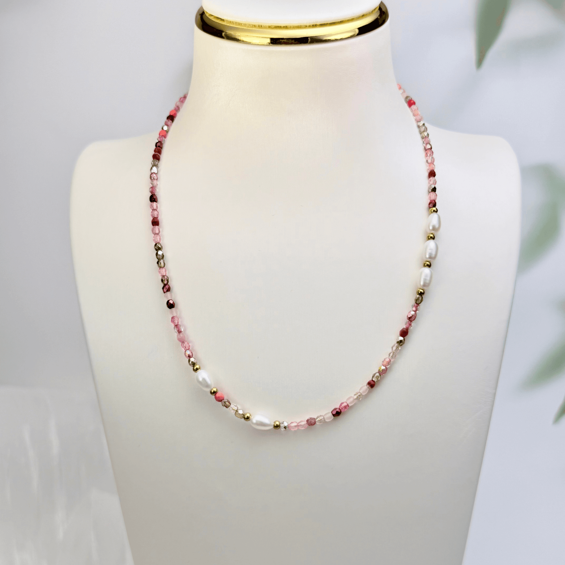 Handmade necklace with 3mm pink Czech glass beads and freshwater pearls, finished with gold or silver findings.
