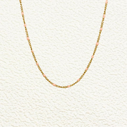 PVD gold stainless steel chain with pink enamel dot accents, versatile as necklace, bracelet, or anklet