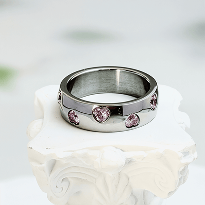 pink heart crystal silver ring on polished dome band
