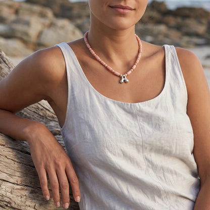 Pink opal initial necklace with barrel and rondelle beads, sterling silver spacers and a bubble letter pendant