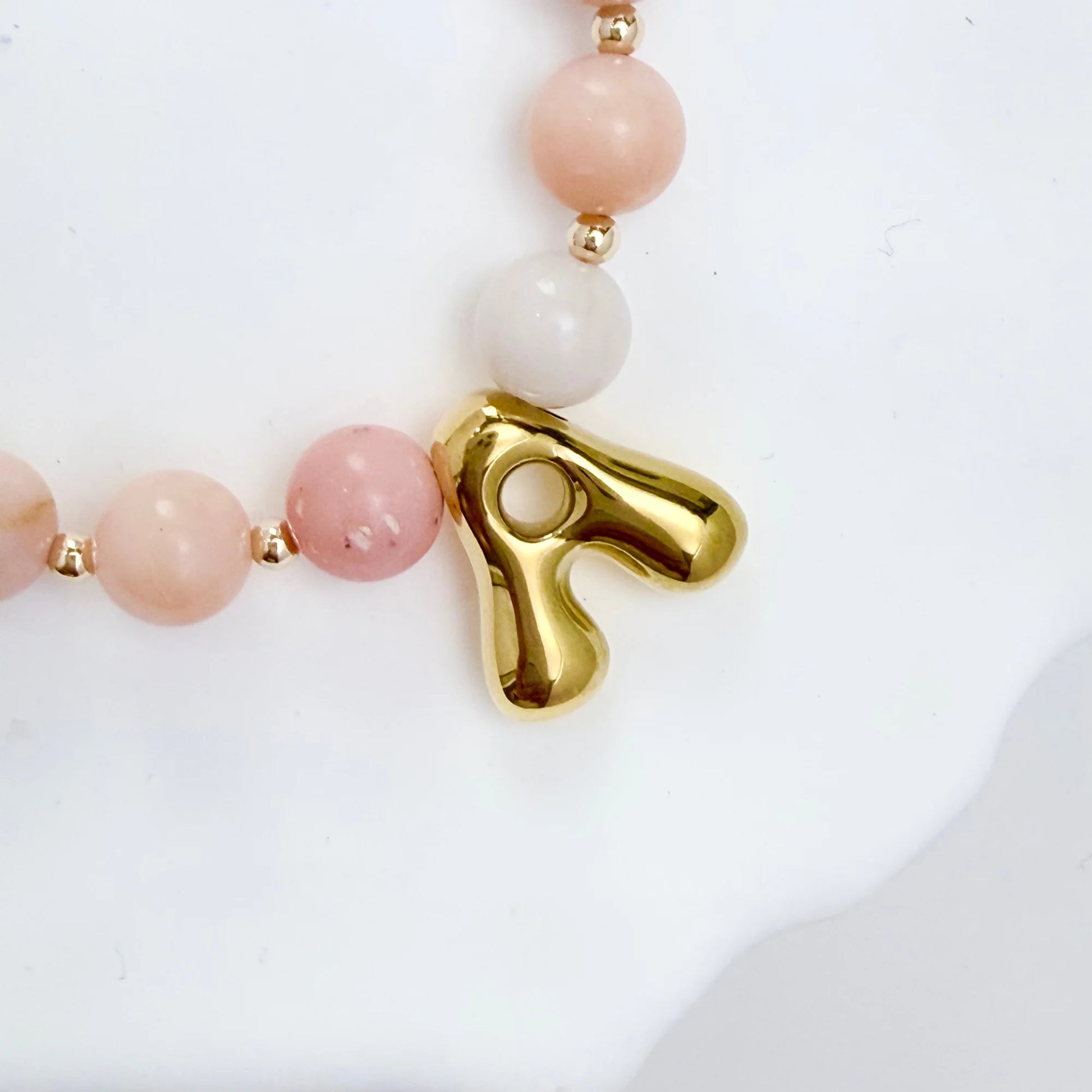 Pink opal beaded necklace with gold filled spacer beads and gold initial pendant MXW Jewellery