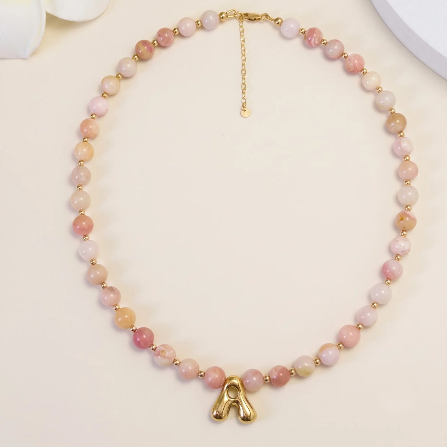 Pink opal beaded necklace with gold filled spacer beads and gold initial pendant MXW Jewellery