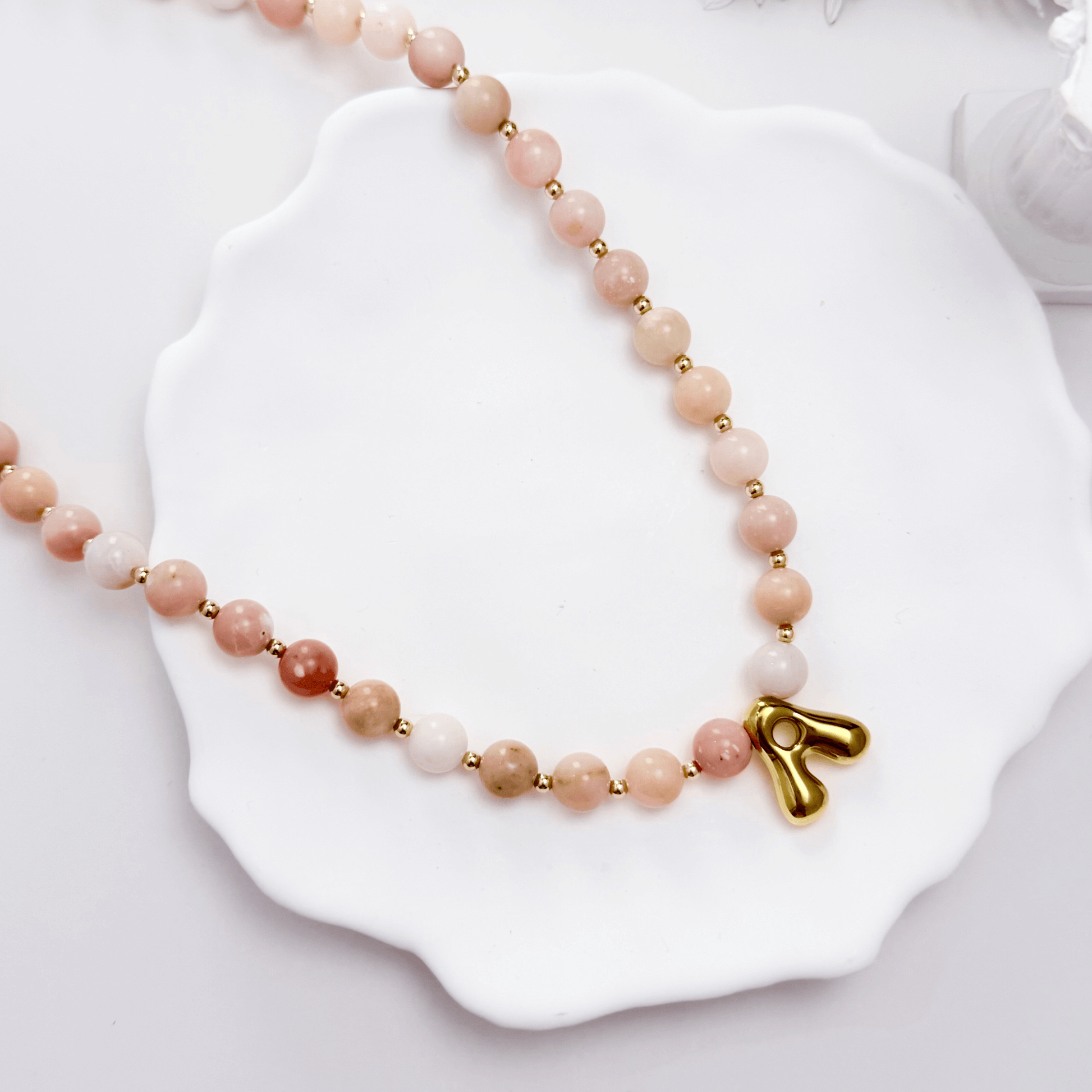 Pink opal beaded necklace with gold filled spacer beads and gold initial pendant MXW Jewellery