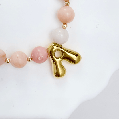 Pink opal beaded necklace with gold filled spacer beads and gold initial pendant MXW Jewellery