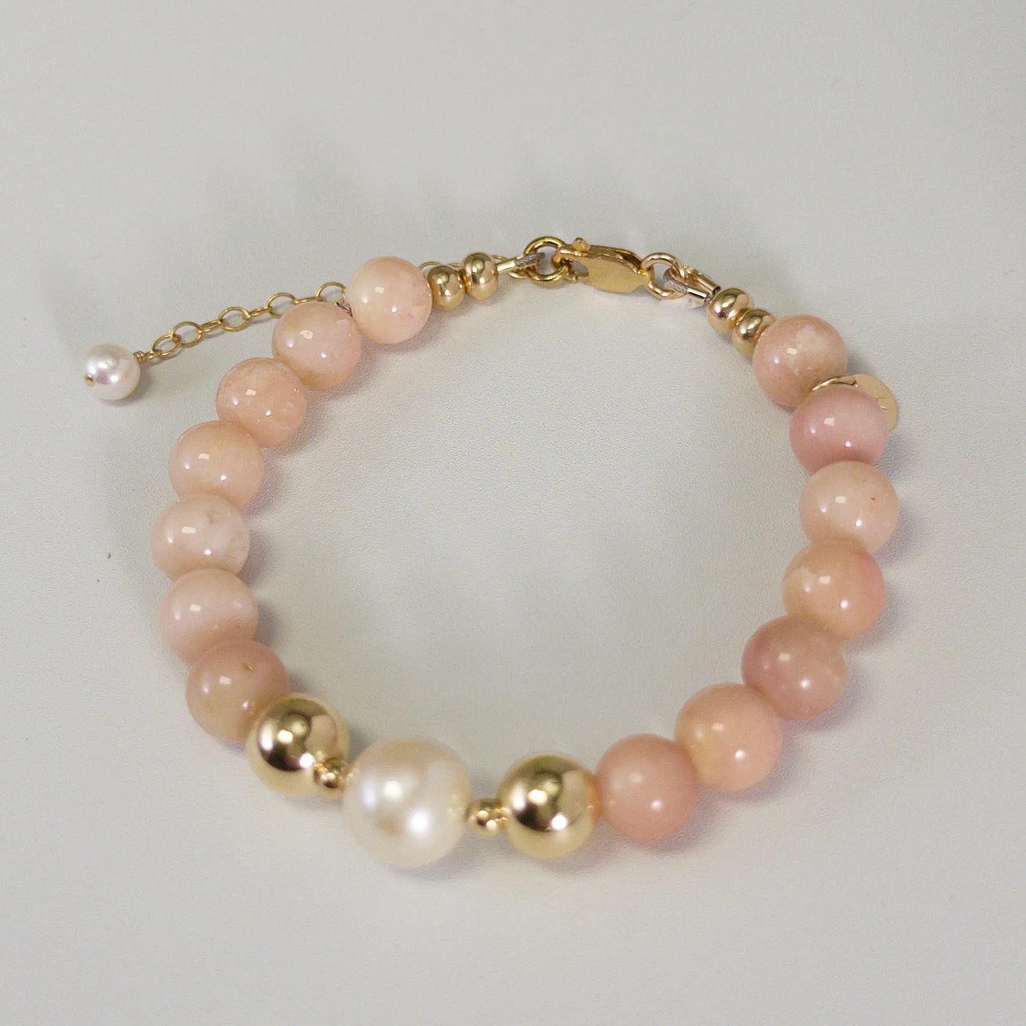 MXW Jewellery pink opal beaded bracelet with stamped initial disc and premium freshwater pearl.
