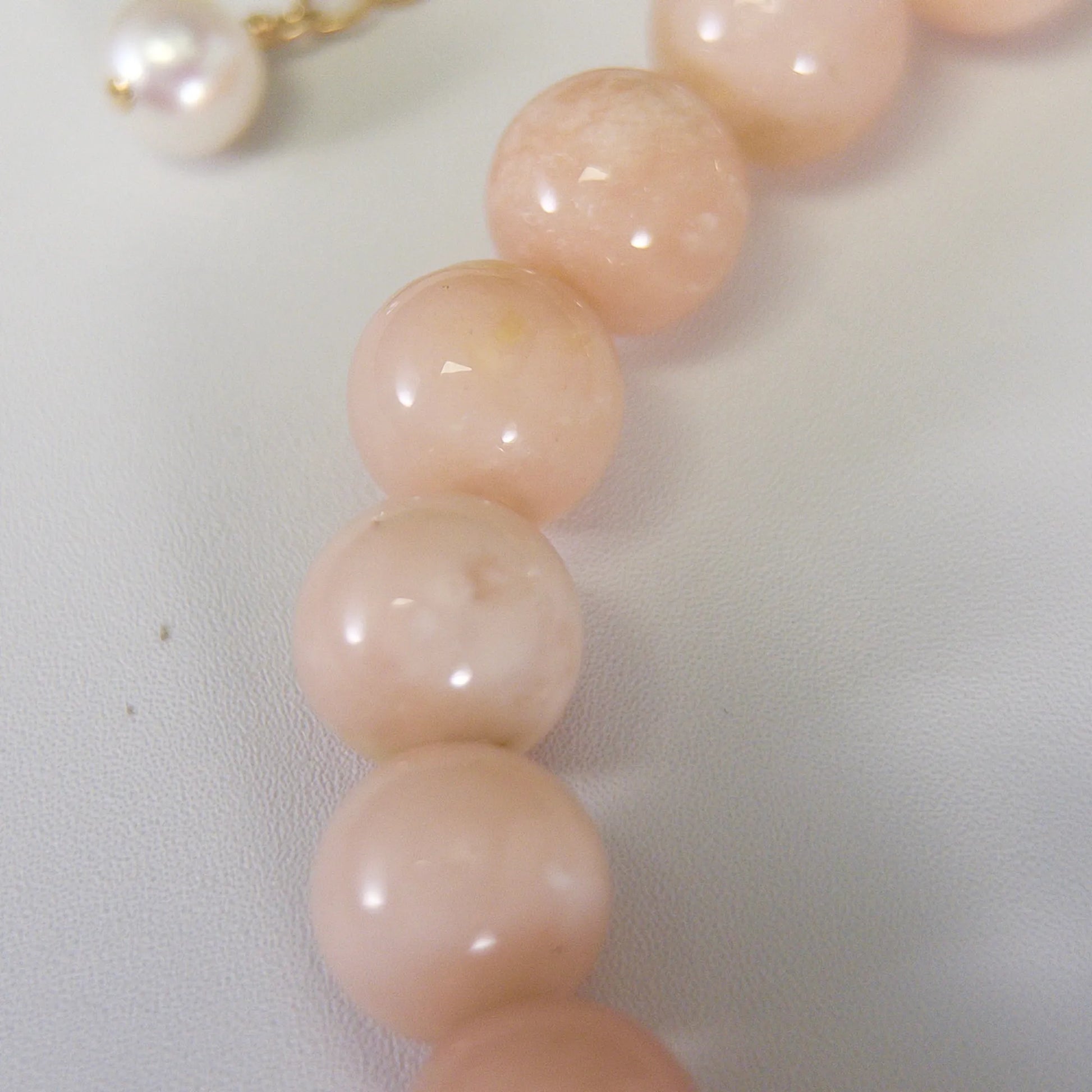 MXW Jewellery pink opal beaded bracelet with stamped initial disc and premium freshwater pearl.