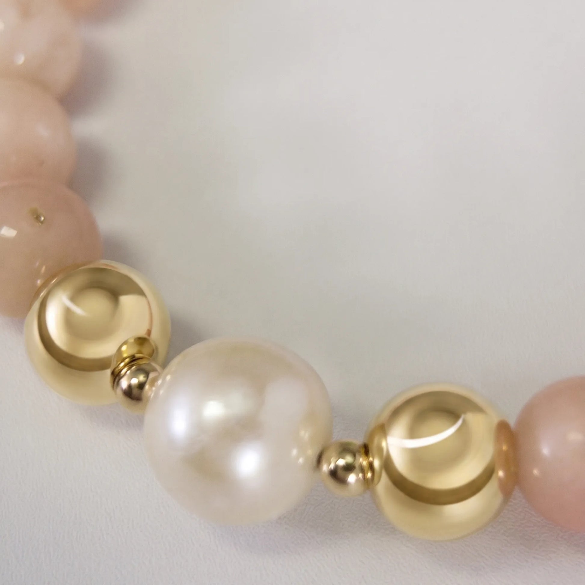 MXW Jewellery pink opal beaded bracelet with stamped initial disc and premium freshwater pearl.