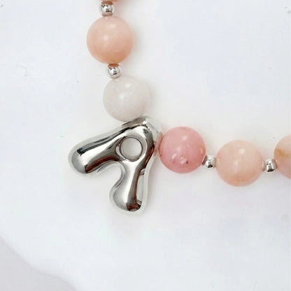 Natural pink opal and 925 sterling silver beaded necklace with personalised bubble initial charm, hand-finished in Australia