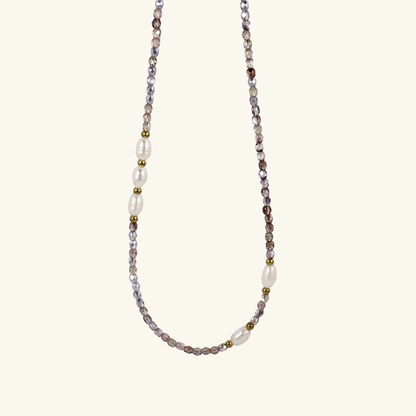 Handmade necklace with 3mm purple Czech glass beads and freshwater pearls, finished with gold or silver findings.