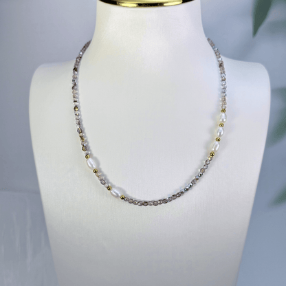 Handmade necklace with 3mm purple Czech glass beads and freshwater pearls, finished with gold or silver findings.