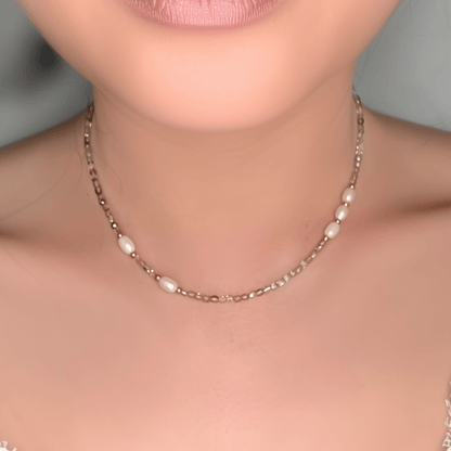 Handmade necklace with 3mm purple Czech glass beads and freshwater pearls, finished with gold or silver findings.