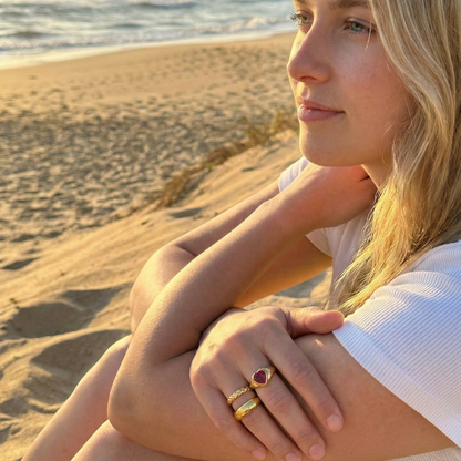 Slim quilted gold band ring with textured designer-inspired pattern.