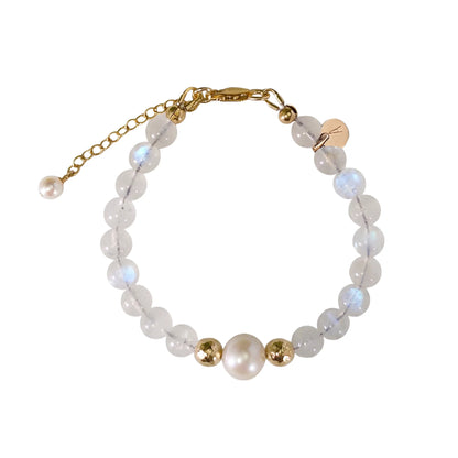 Rainbow moonstone, pearl and initial gold bracelet featuring luminous gemstone beads, lustrous freshwater pearls and a personalised gold-filled stamped initial disc.