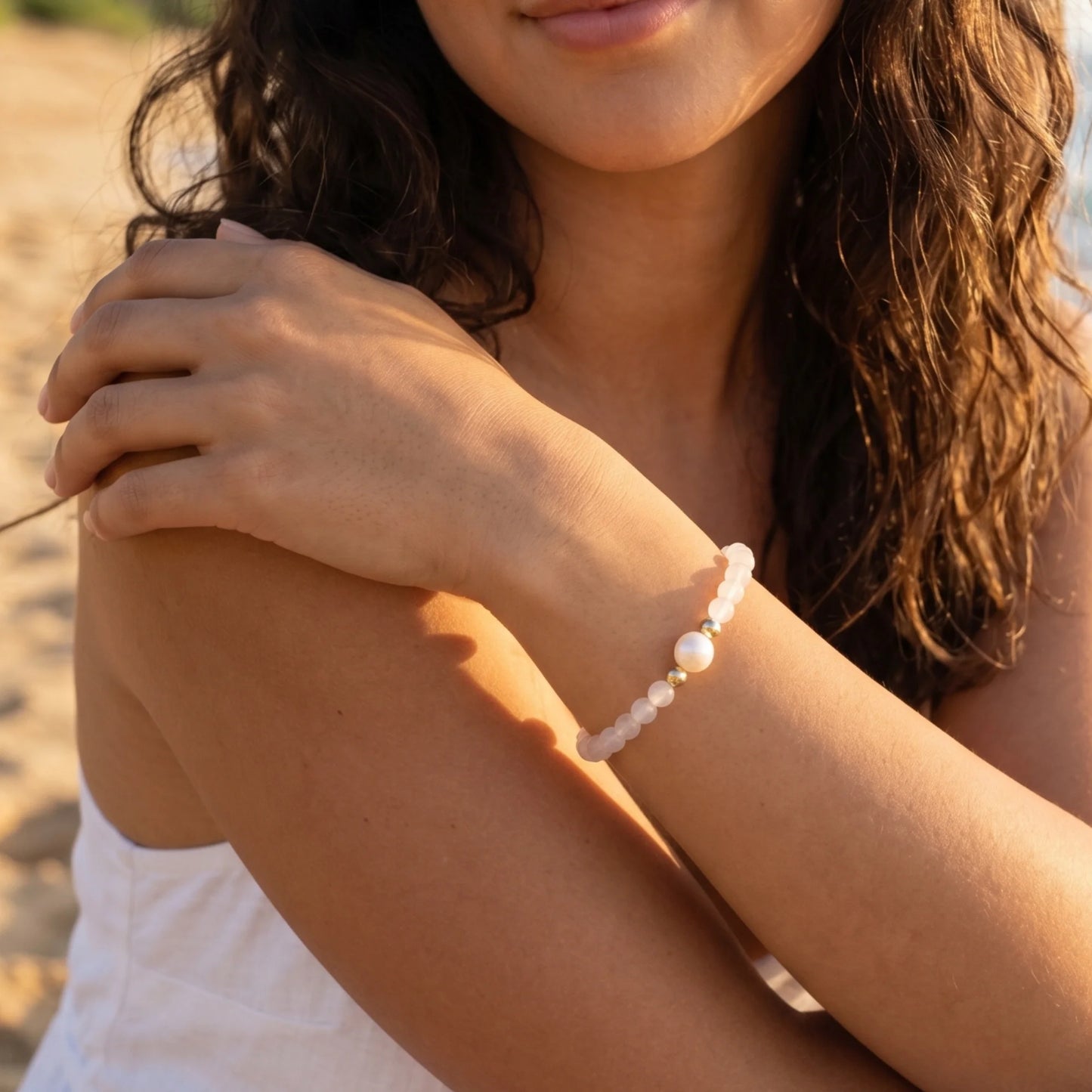 Rainbow moonstone, pearl and initial gold bracelet featuring luminous gemstone beads, lustrous freshwater pearls and a personalised gold-filled stamped initial disc.